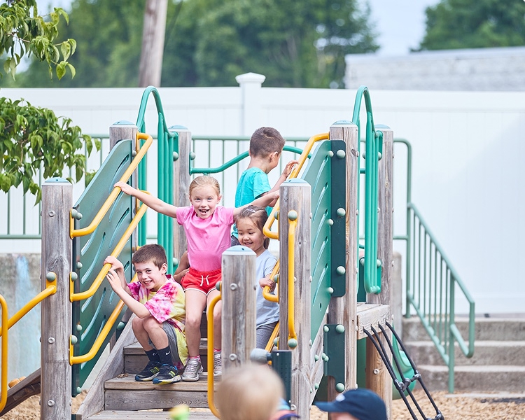 CHDS- Story-main Preschool students playing on a school playground