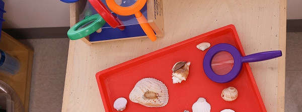 nav kindergarten magnifying glass station