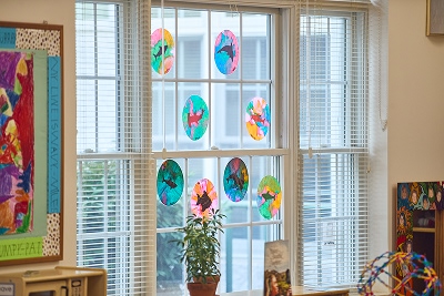 Pre-K artwork on sunny windows